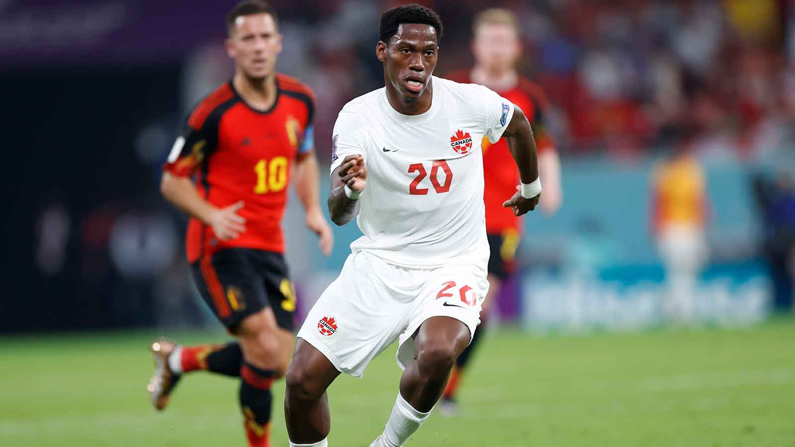 Jonathan David celebrating his hat trick during Canada's historic World Cup win against Qatar.