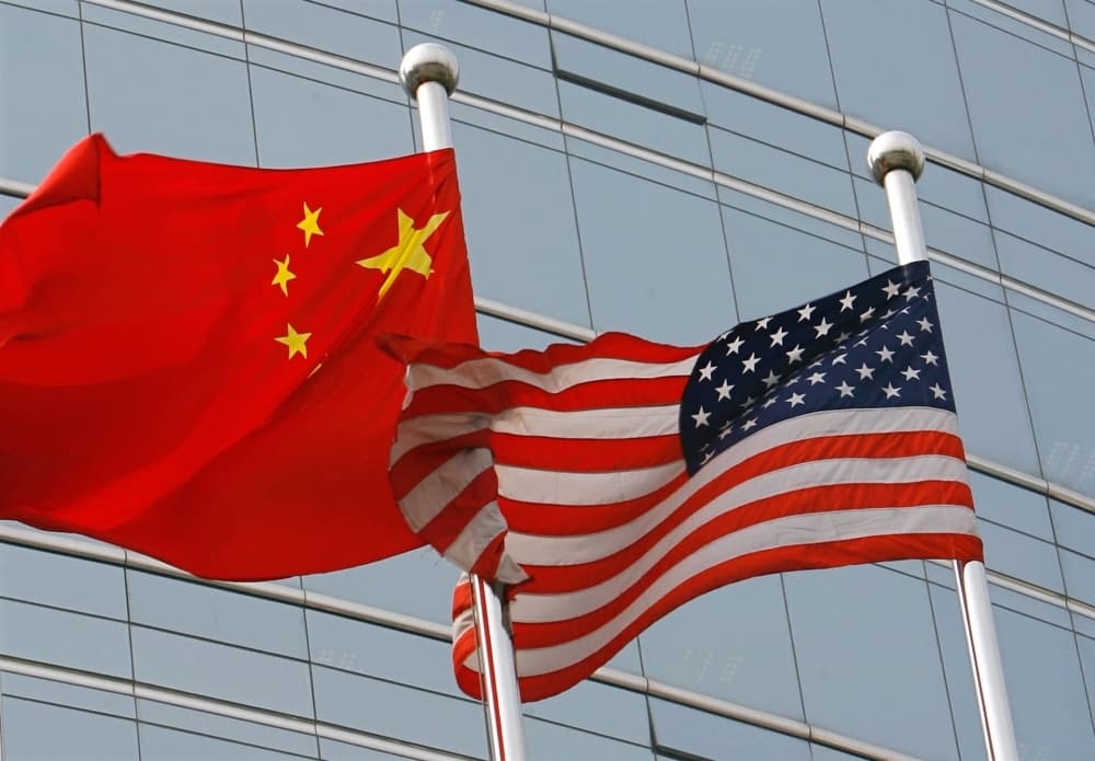 Chinese and US military representatives in discussion in Hawaii.