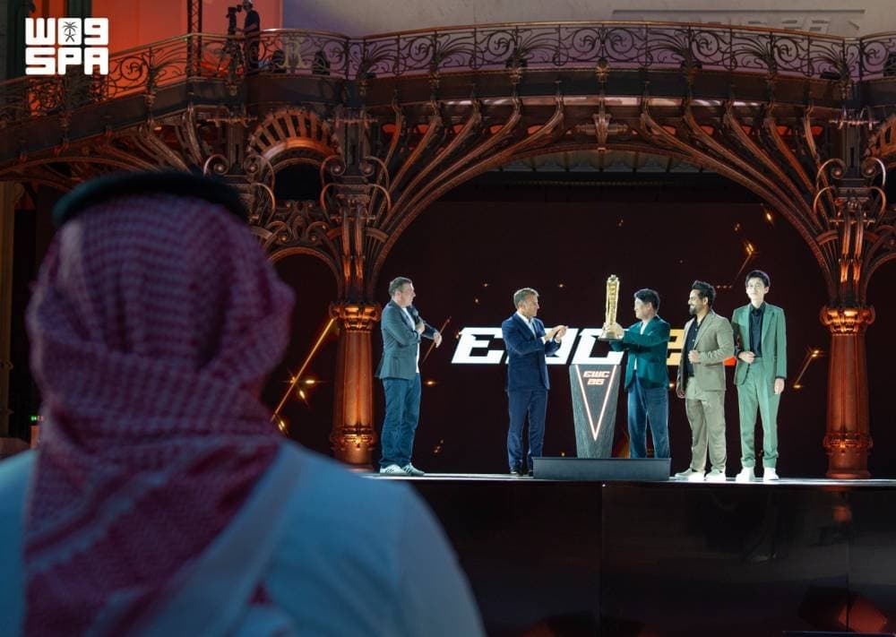 Saudi Crown Prince and French President awarding the Esports World Cup trophy, showcasing esports as a diplomatic tool.