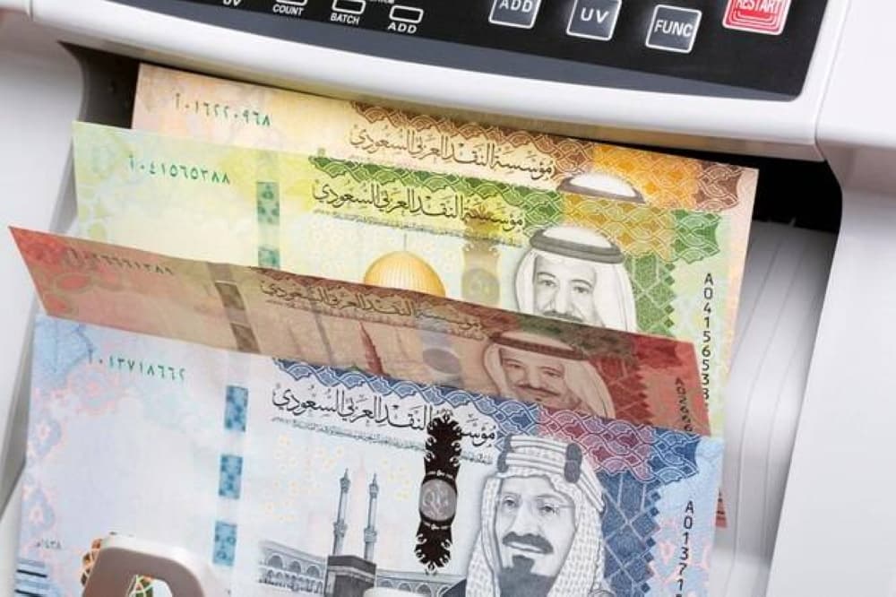 Infographic showing the growth of Saudi public investment fund assets and the shift towards money markets and debt instruments.