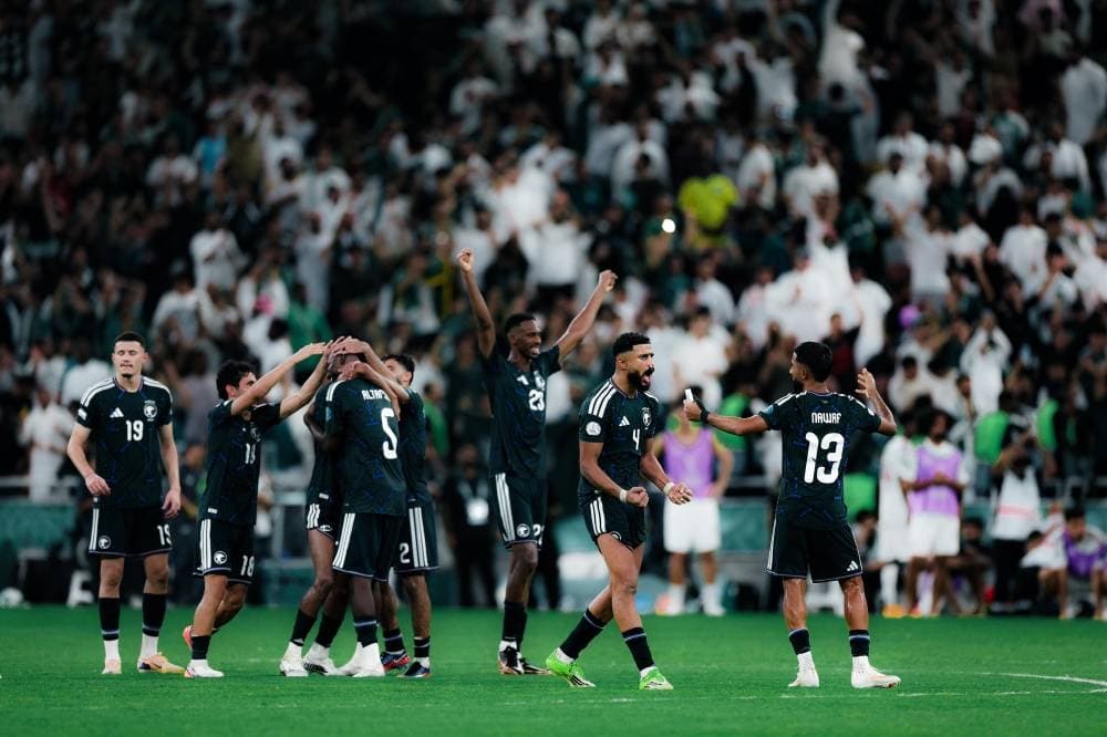 Saudi national football team celebrating their penalty shootout victory in Khaleeji 27, showcasing regional pride and resilience.