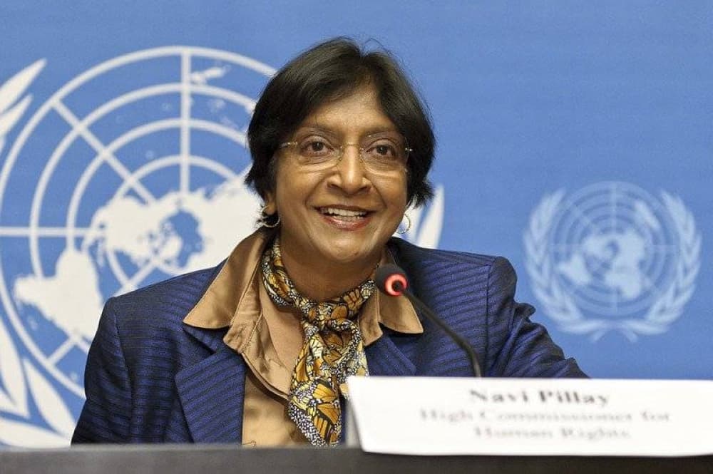 Navi Pillay receiving the Nobel Peace Prize, representing a shift towards accountability in international law.