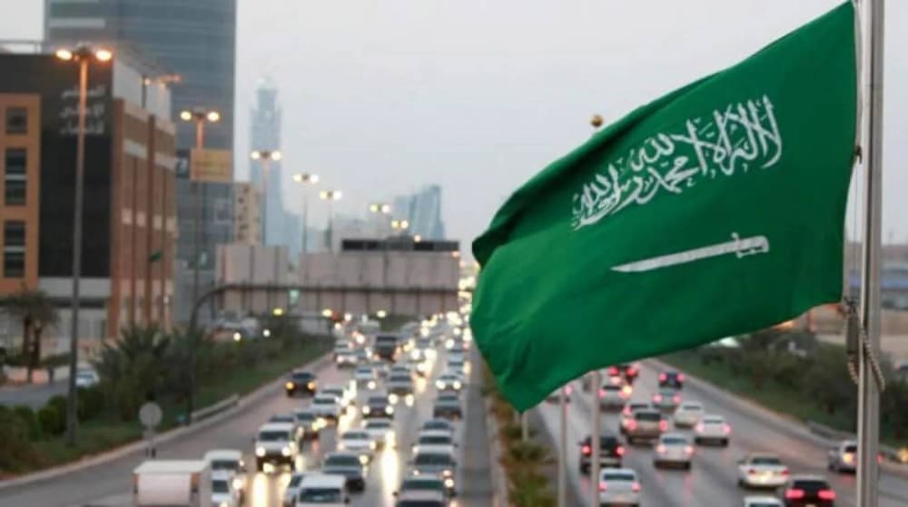 Infographic showing Saudi Arabia's GDP growth forecast and energy export routes amidst regional tensions.