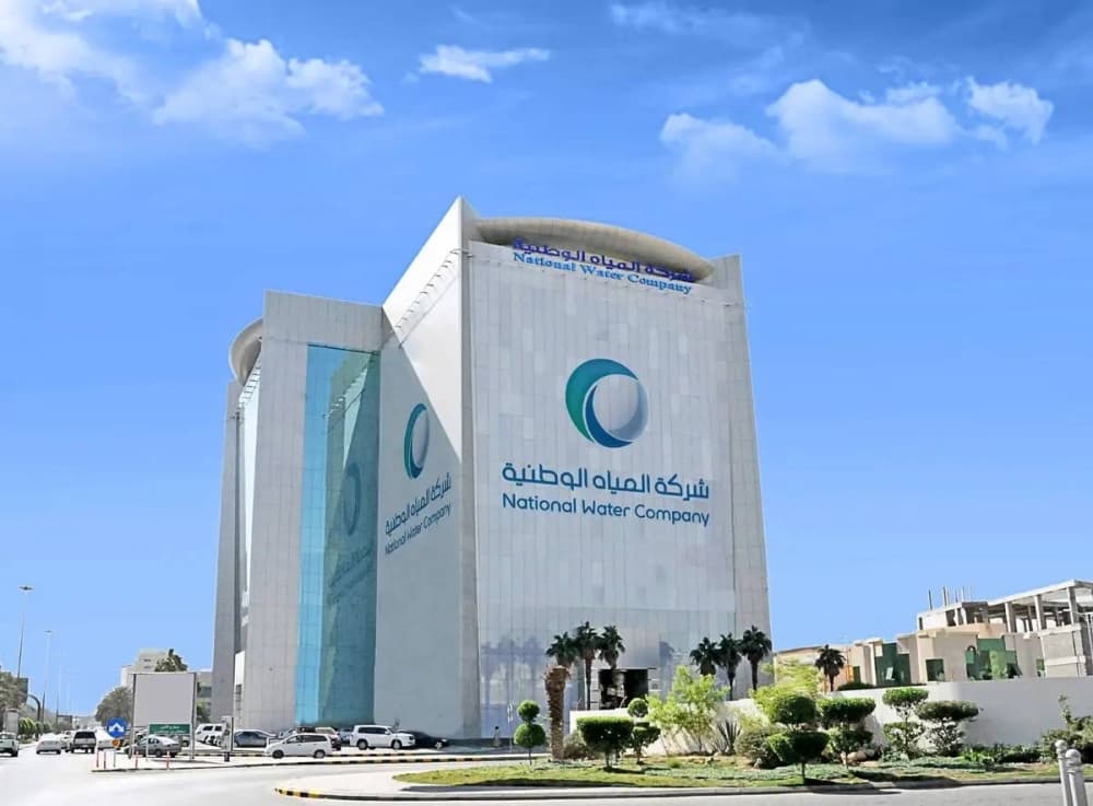 Infographic detailing the National Water Company four-tier residential water tariff rates in Saudi Arabia.