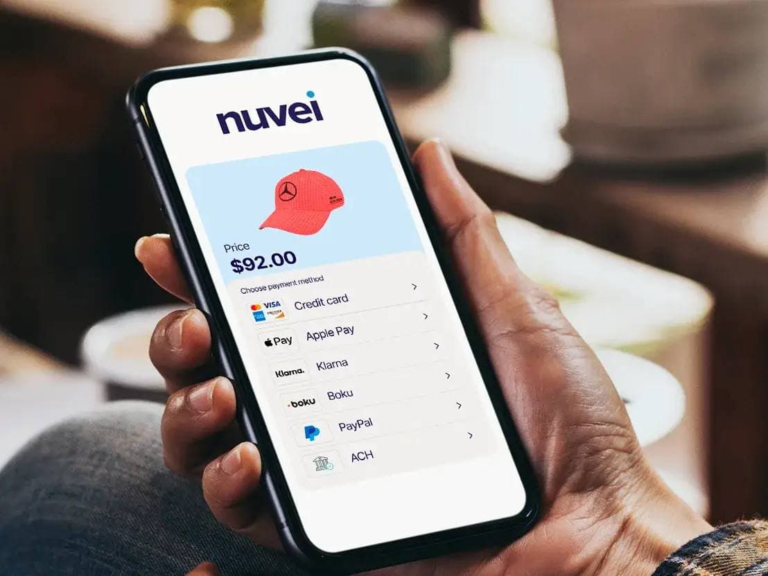 Nuvei and Payoneer logos with a financial backdrop