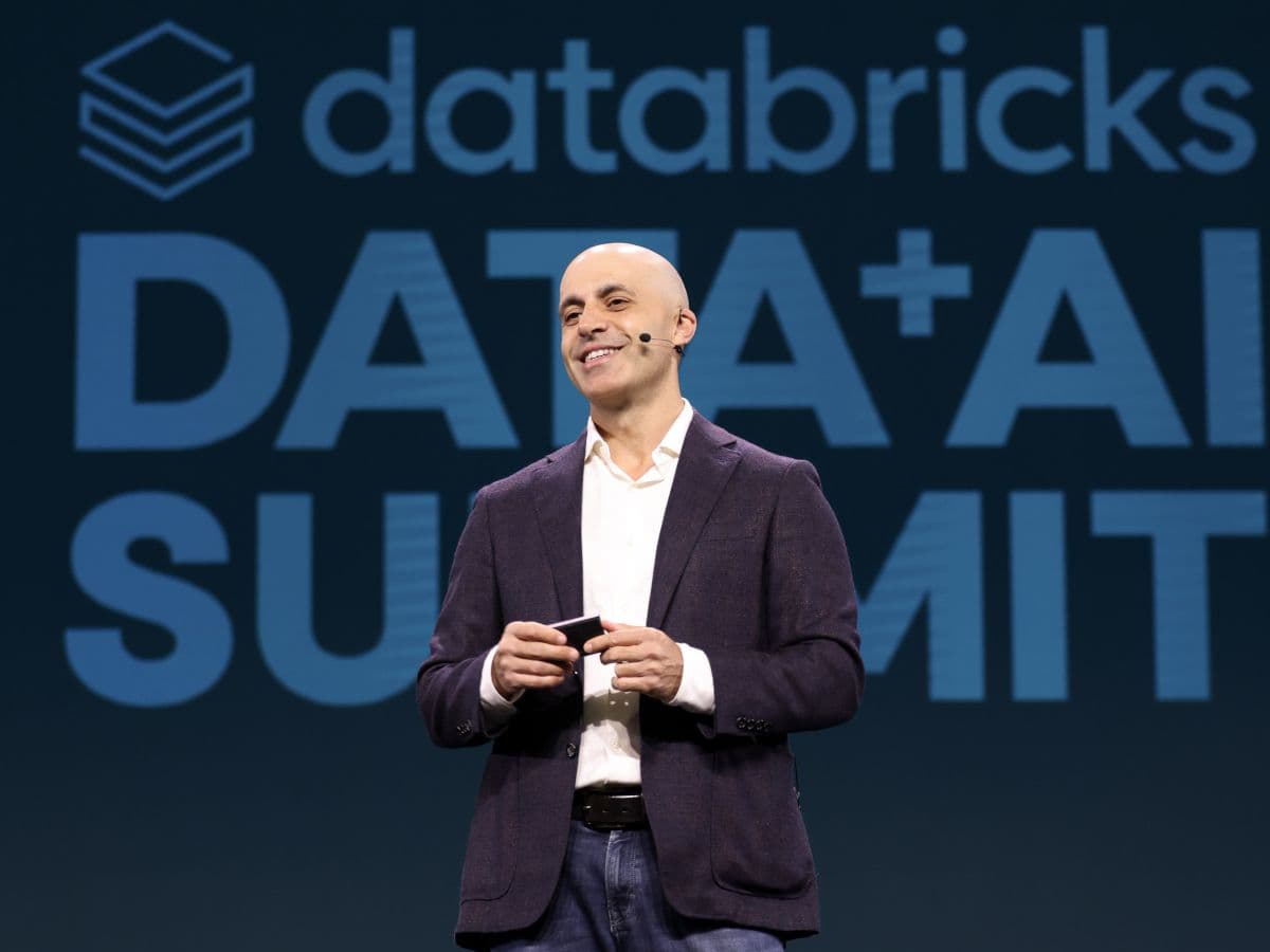 Databricks logo with a financial growth chart background