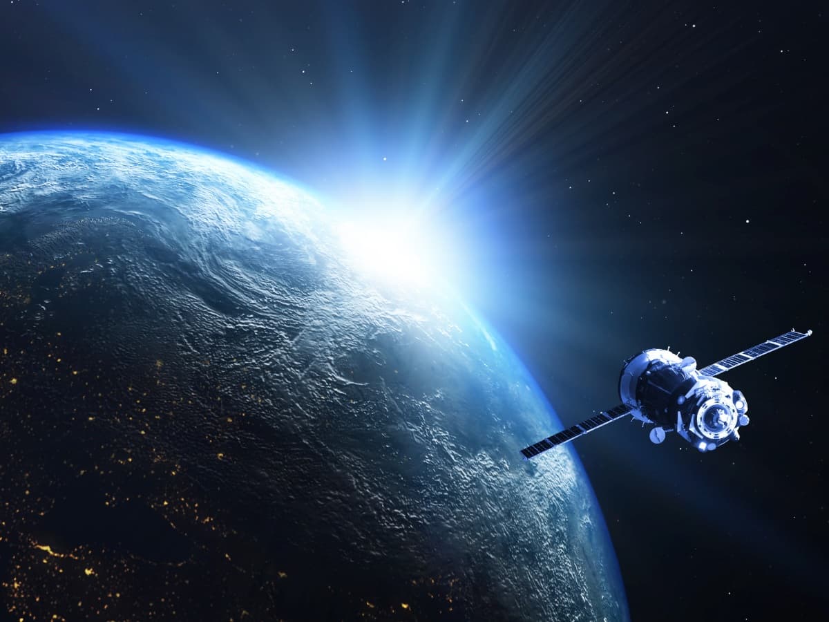 Conceptual diagram of Google's Project Suncatcher satellite illustrating its solar power generation and AI processing capabilities.