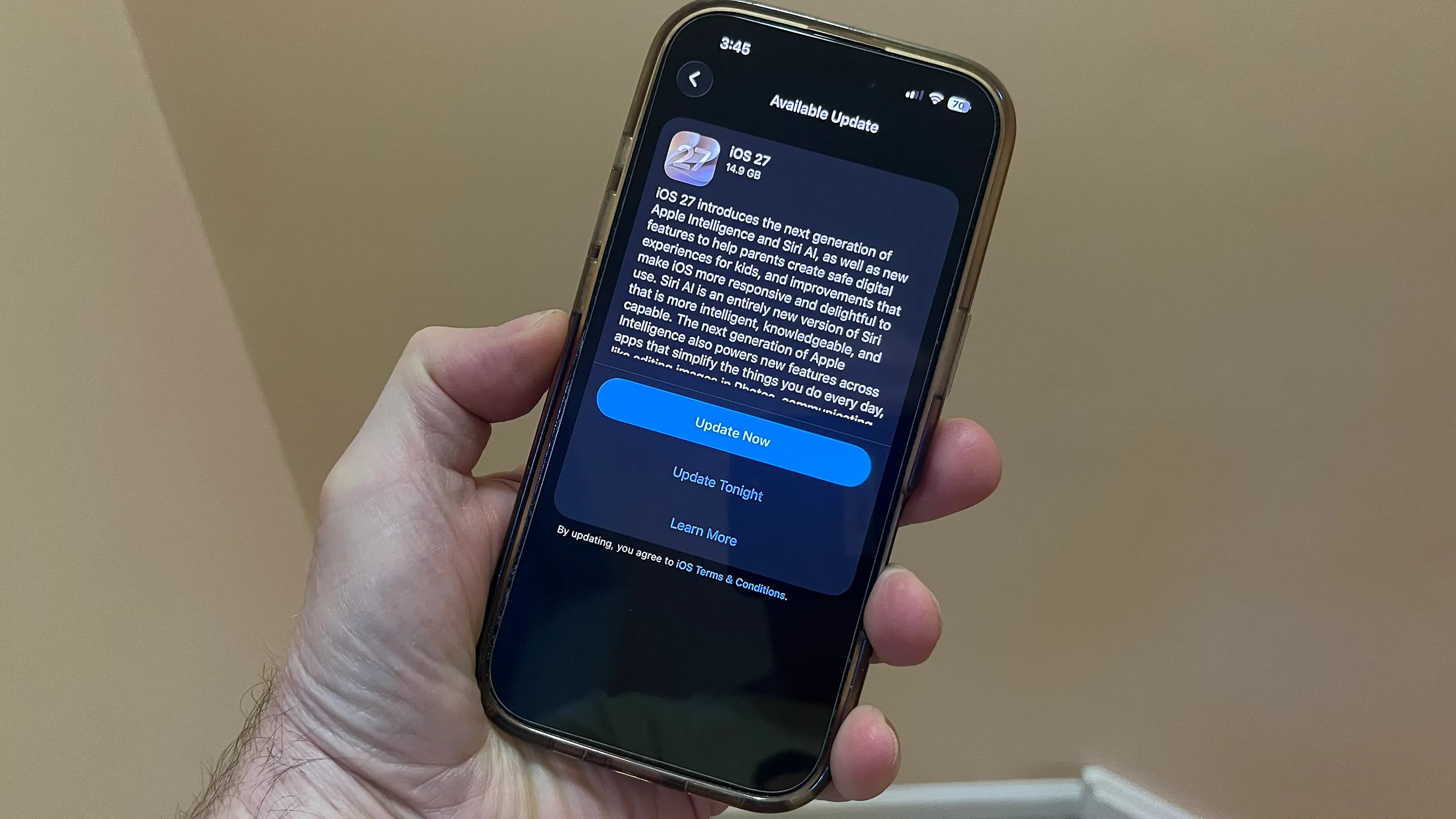 Graphic showing Apple iOS 27 features including Siri AI and security updates.