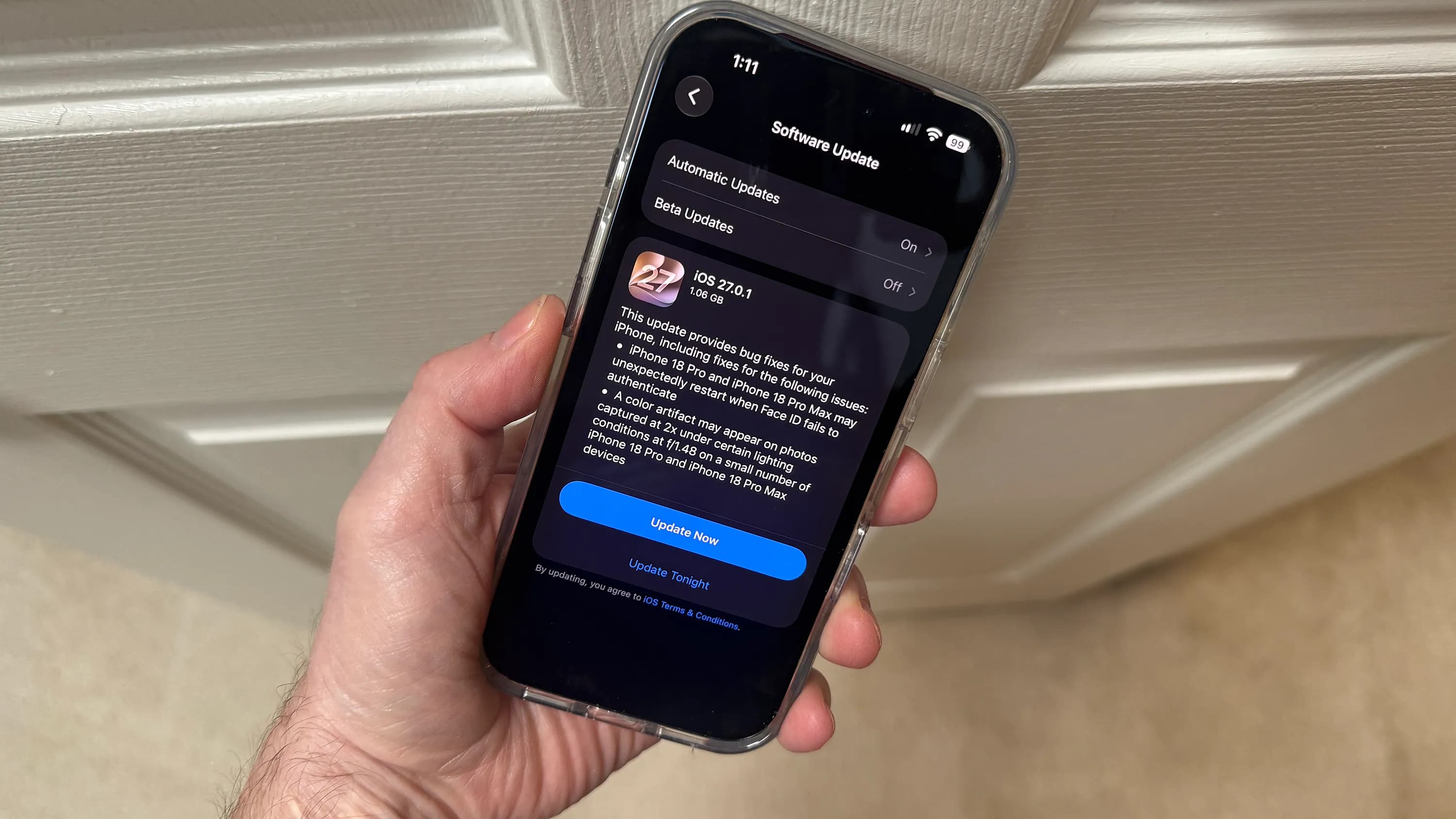 Graphic showing Apple iOS 27.0.1 update details and fixes for iPhone 18 Pro.