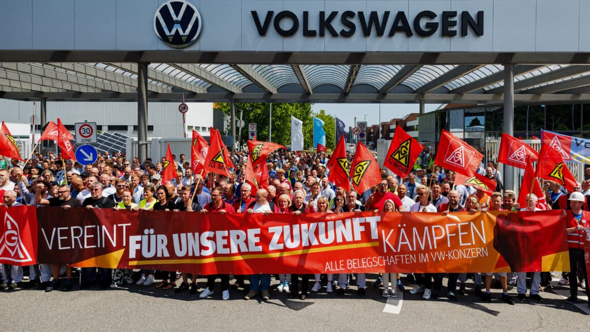 Protesters rally against Volkswagen's proposed job cuts in Germany.