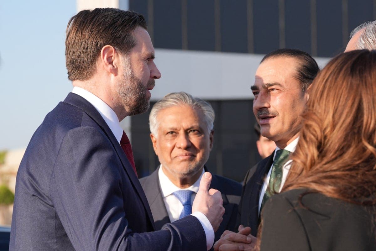 Diplomatic negotiations between the US and Iran in a tense atmosphere.