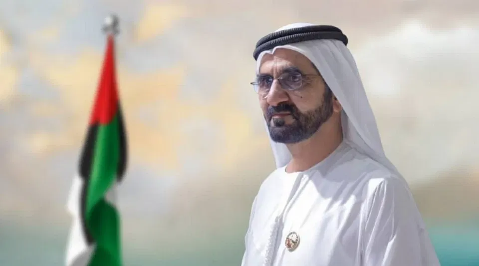 Sheikh Mohammed bin Rashid Al Maktoum signing the new community development law.