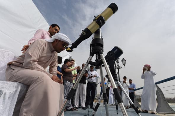 Astronomers at Al Khateem Observatory observing Haumea's occultation.