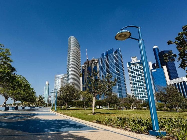Abu Dhabi skyline with a focus on sustainable infrastructure projects