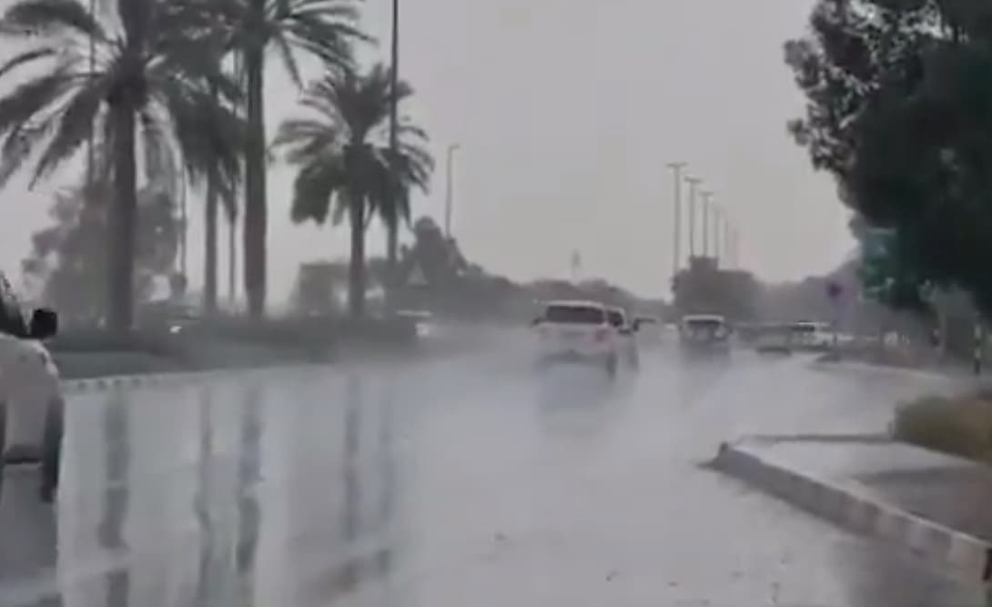 A dramatic sky with dark clouds over the UAE, indicating impending rain and strong winds.