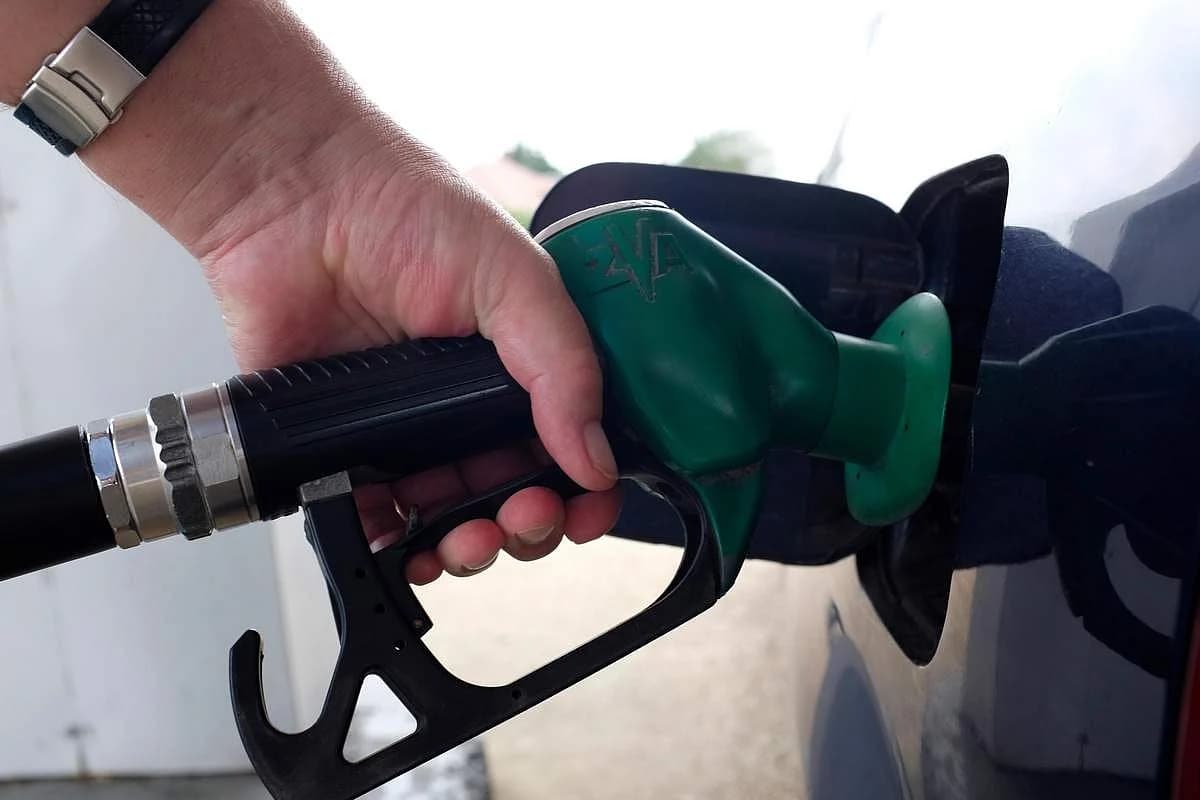 Graph showing the decline of global oil prices and its impact on UAE petrol prices.