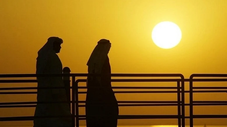 A desert landscape in the UAE under extreme summer heat conditions.