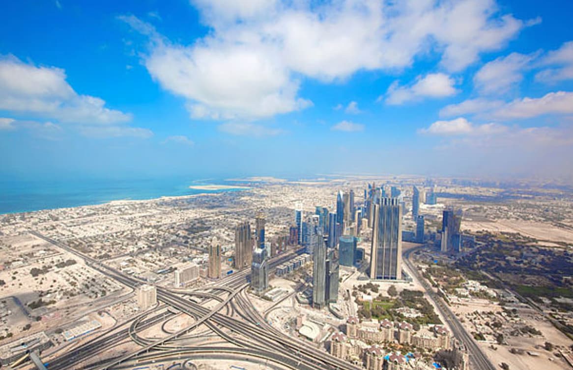 Forecast for Dubai on October 6, 2026, showing 36°C high temperature and humidity levels.