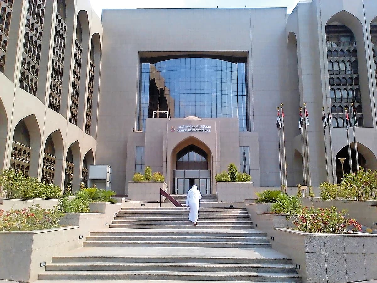 UAE Central Bank building with financial regulations overlay