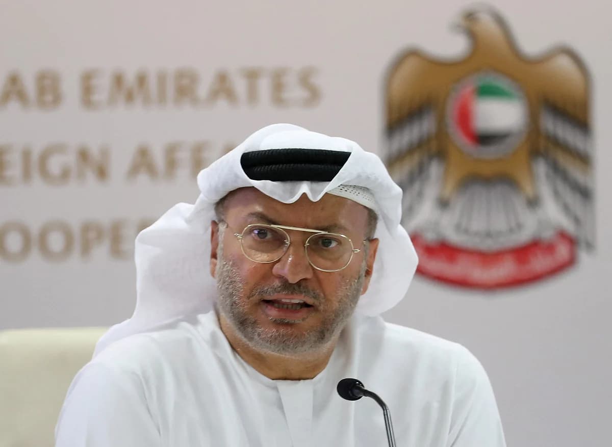 Anwar Gargash addressing media, denying labour residency cancellations related to Iran.