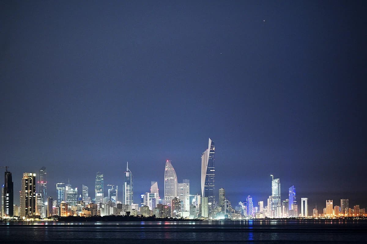 Kuwait skyline with investment opportunities highlighted