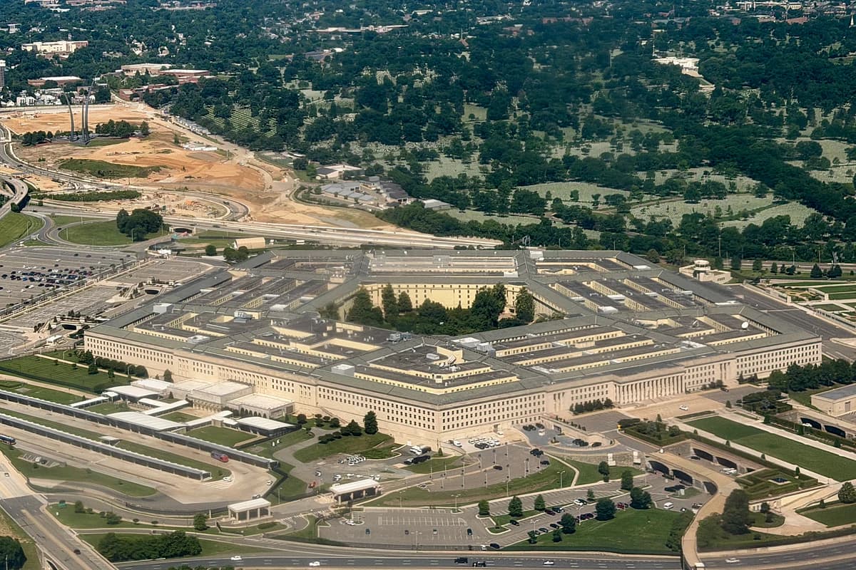 Emergency response teams at the Pentagon during a hazardous materials incident, showcasing safety protocols in action.
