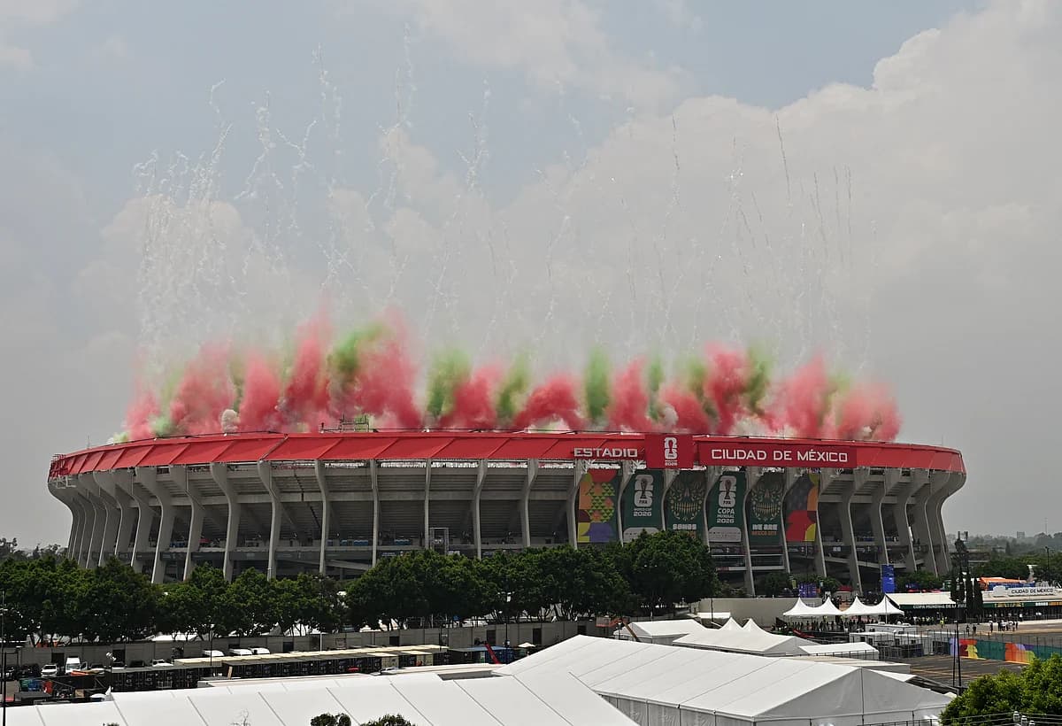 Fans celebrating at the 2026 FIFA World Cup opening match in Mexico City.