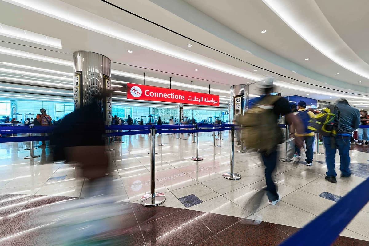 Illustration of flight cancellations and regional security tensions affecting UAE travelers.