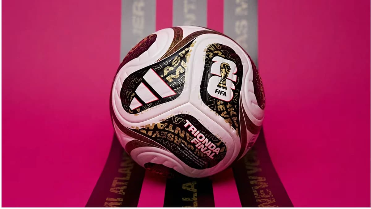 A vibrant graphic of the FIFA World Cup final featuring performers and match details.