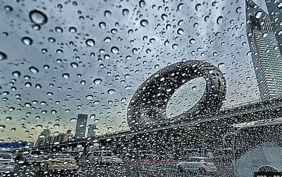 A weather graphic showing peak temperatures and rain forecast for the UAE on August 25, 2026.