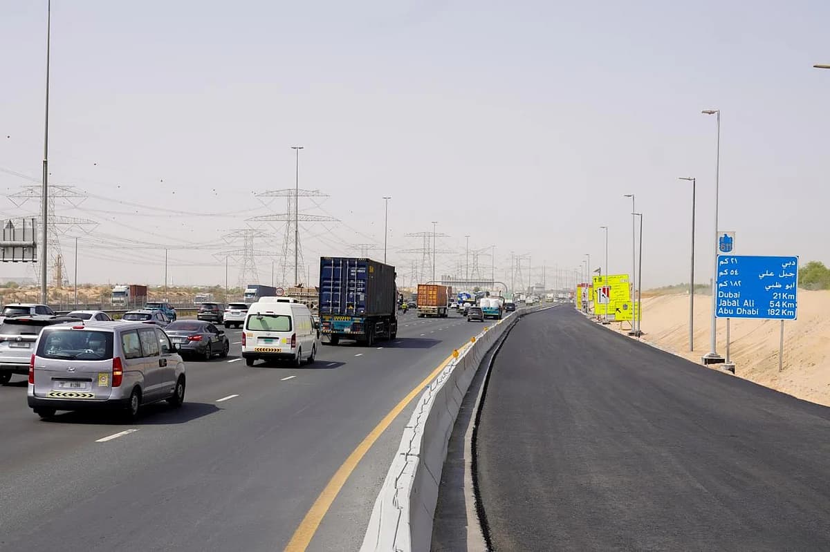 Infographic showing the Emirates Road expansion, highlighting increased capacity and reduced travel times.