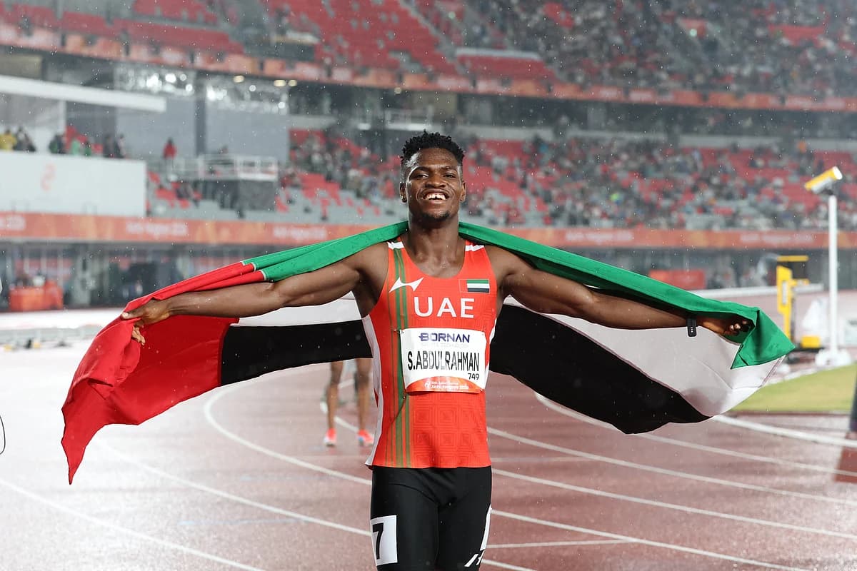 Sulaiman Abdulrahman celebrating his silver medal win in the Men's 400m final at the Asian Games, showcasing UAE's youth sports investment.