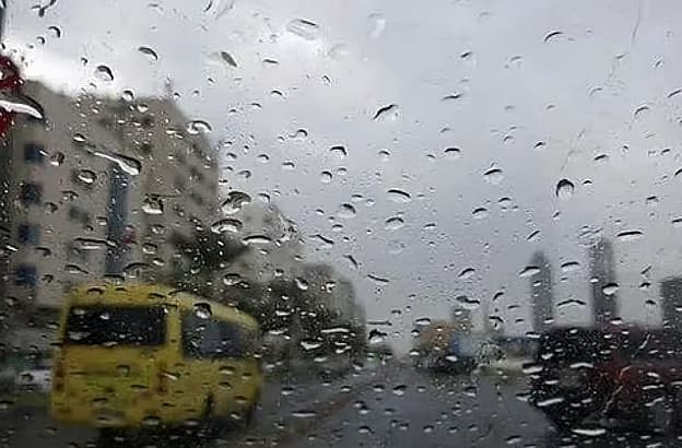 A weather forecast graphic showing high temperatures and light rain for Abu Dhabi in October 2026.