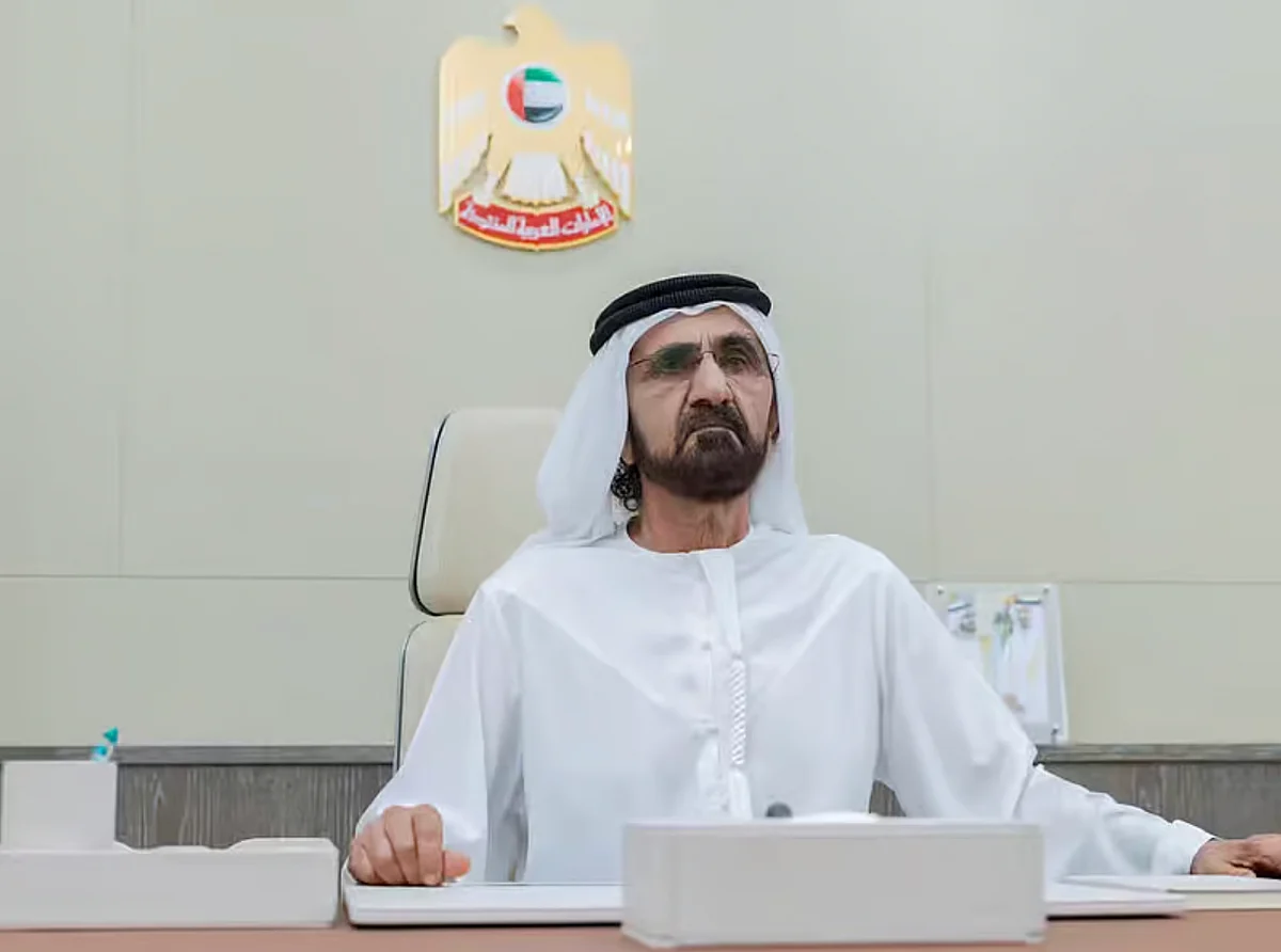 Sheikh Mohammed announcing the Arab Hope Makers initiative with visuals of community projects and past winners.