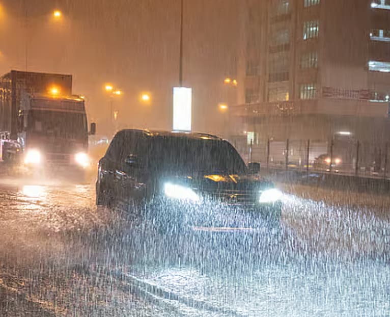 A weather map showing hail and heavy rain across the UAE with safety tips for residents.