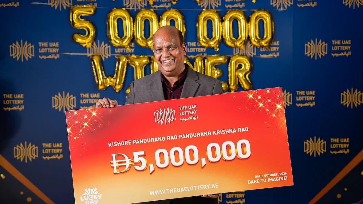 Bold typography highlighting the Dh5 million UAE Lottery prize over a clean navy background