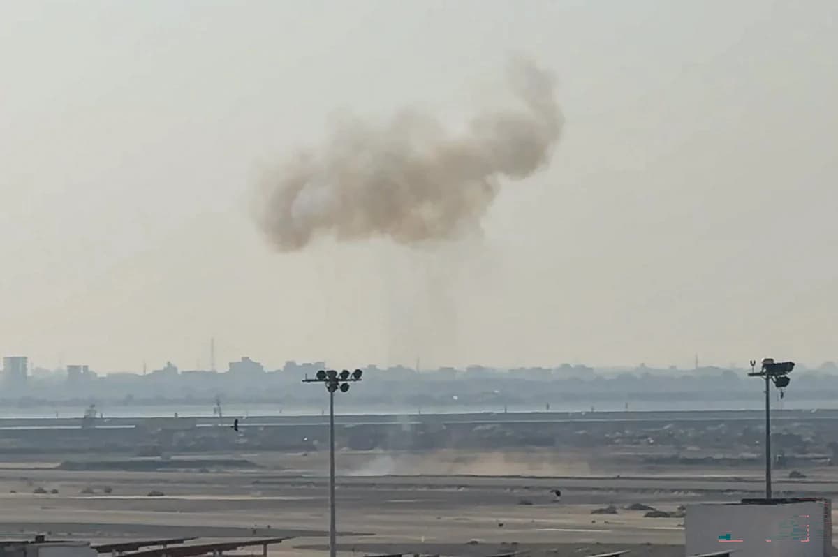 Minimalist dark display showing the number 14 and flight route icon representing the Aden airport missile strike.