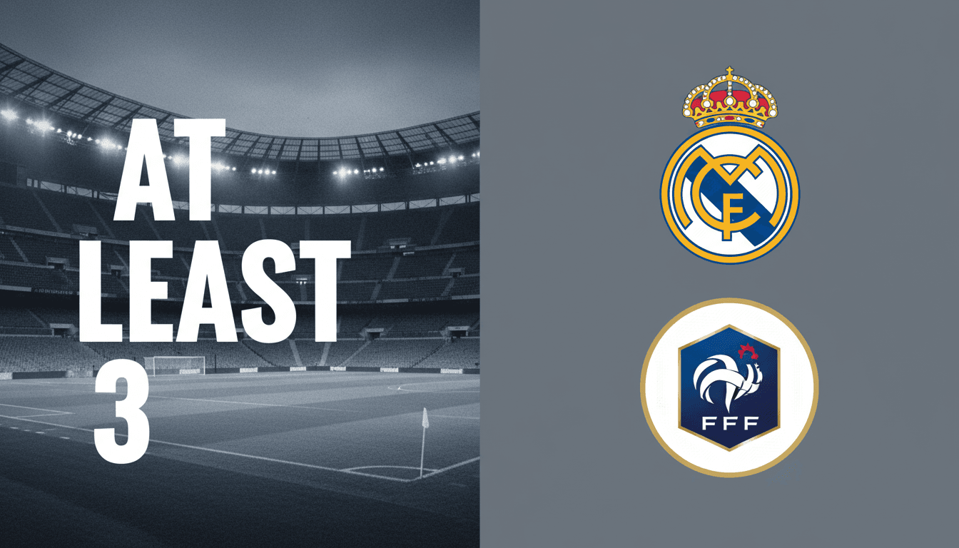 Kylian Mbappé wearing a dark training jacket looking forward with Real Madrid graphics in the background