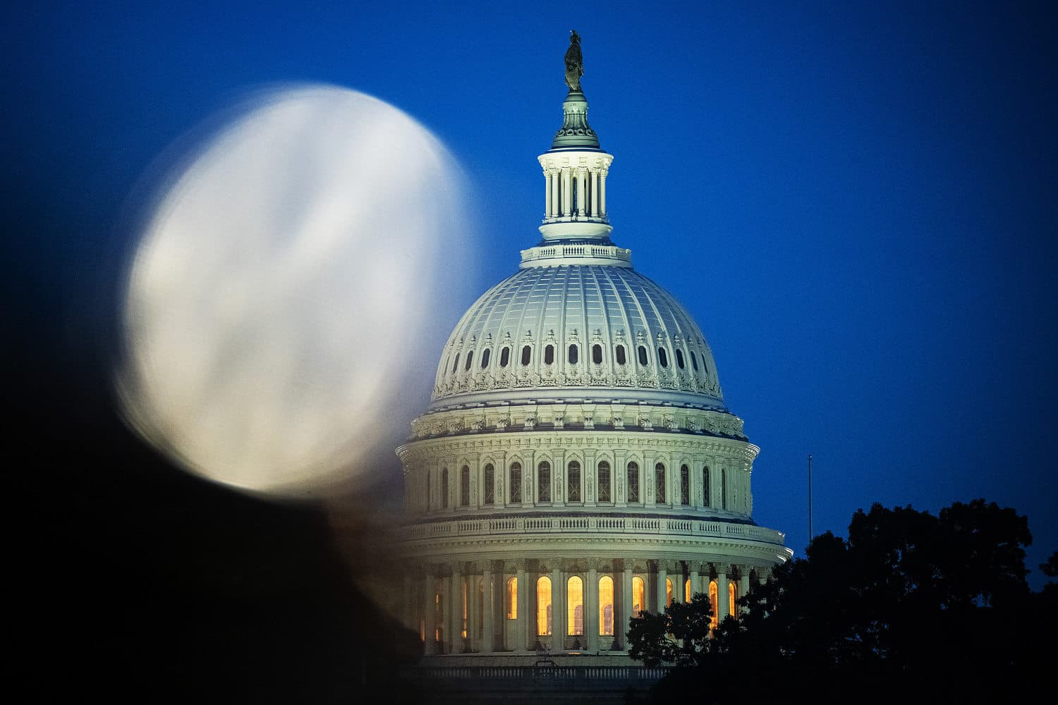 Minimalist dark visual showing the number 4 representing intercepted congressional mail hoax packages.