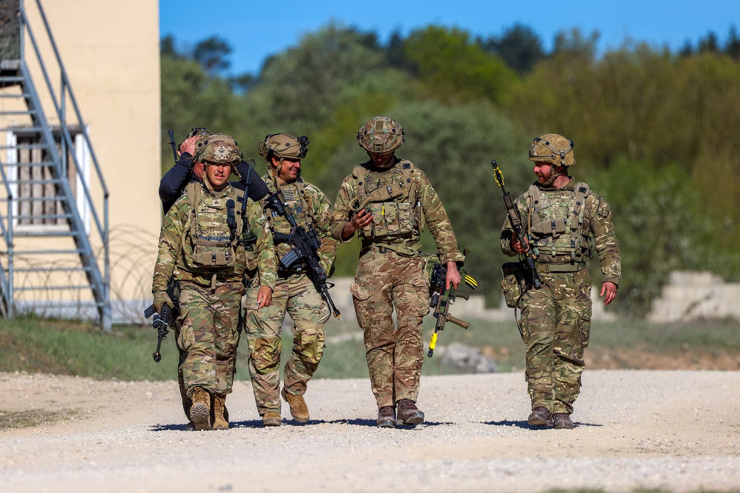 Infographic showing U.S. troop levels in Germany and NATO defense spending trends.