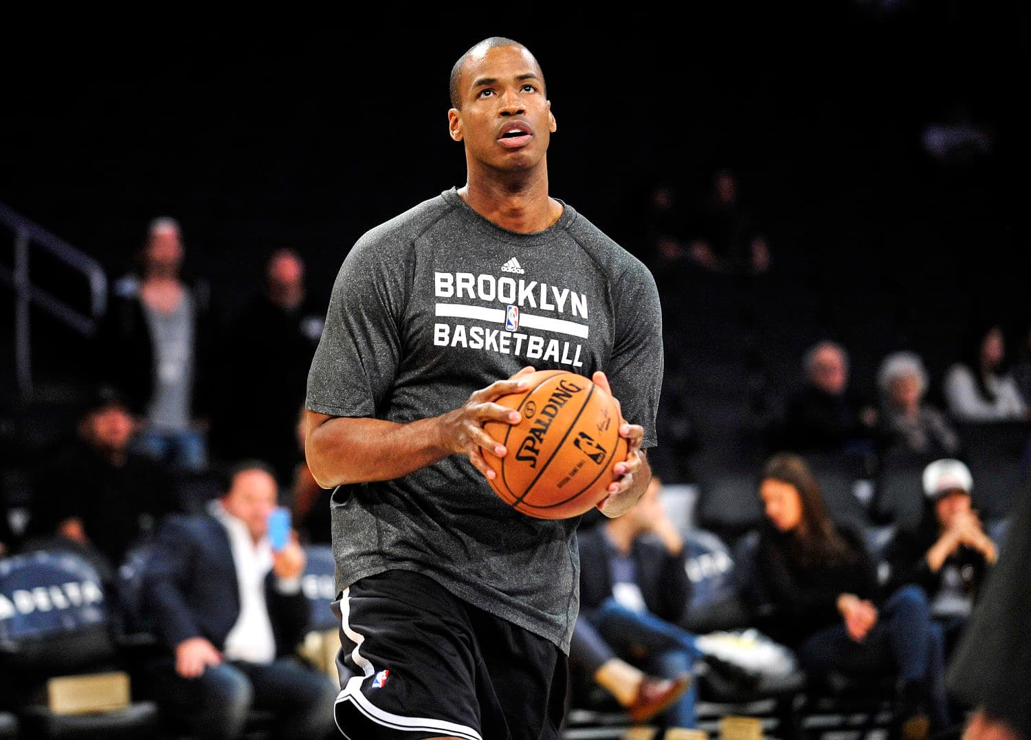 Jason Collins during his NBA career, symbolizing inclusivity in sports.