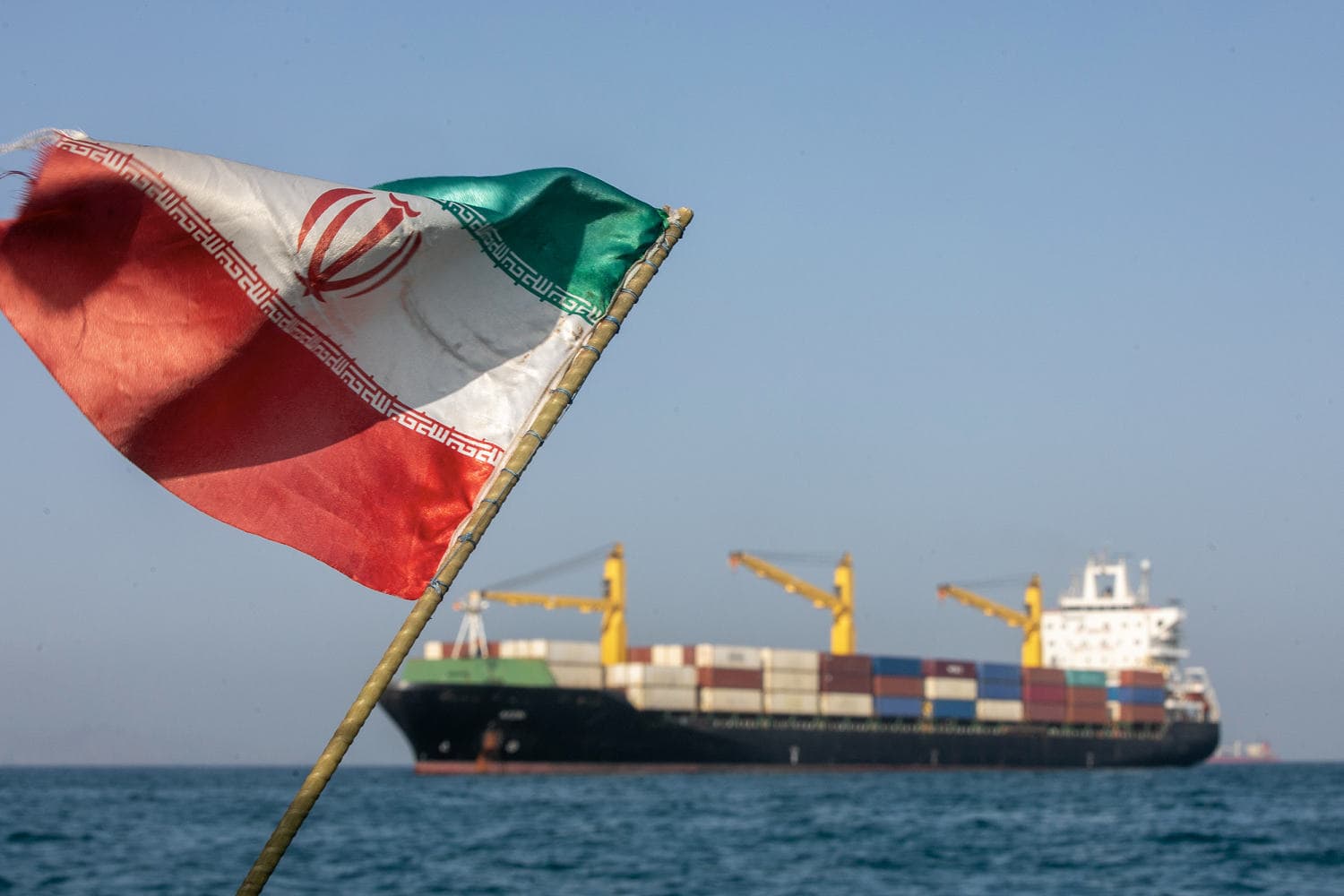 Oil tankers navigating the Strait of Hormuz amidst security concerns.