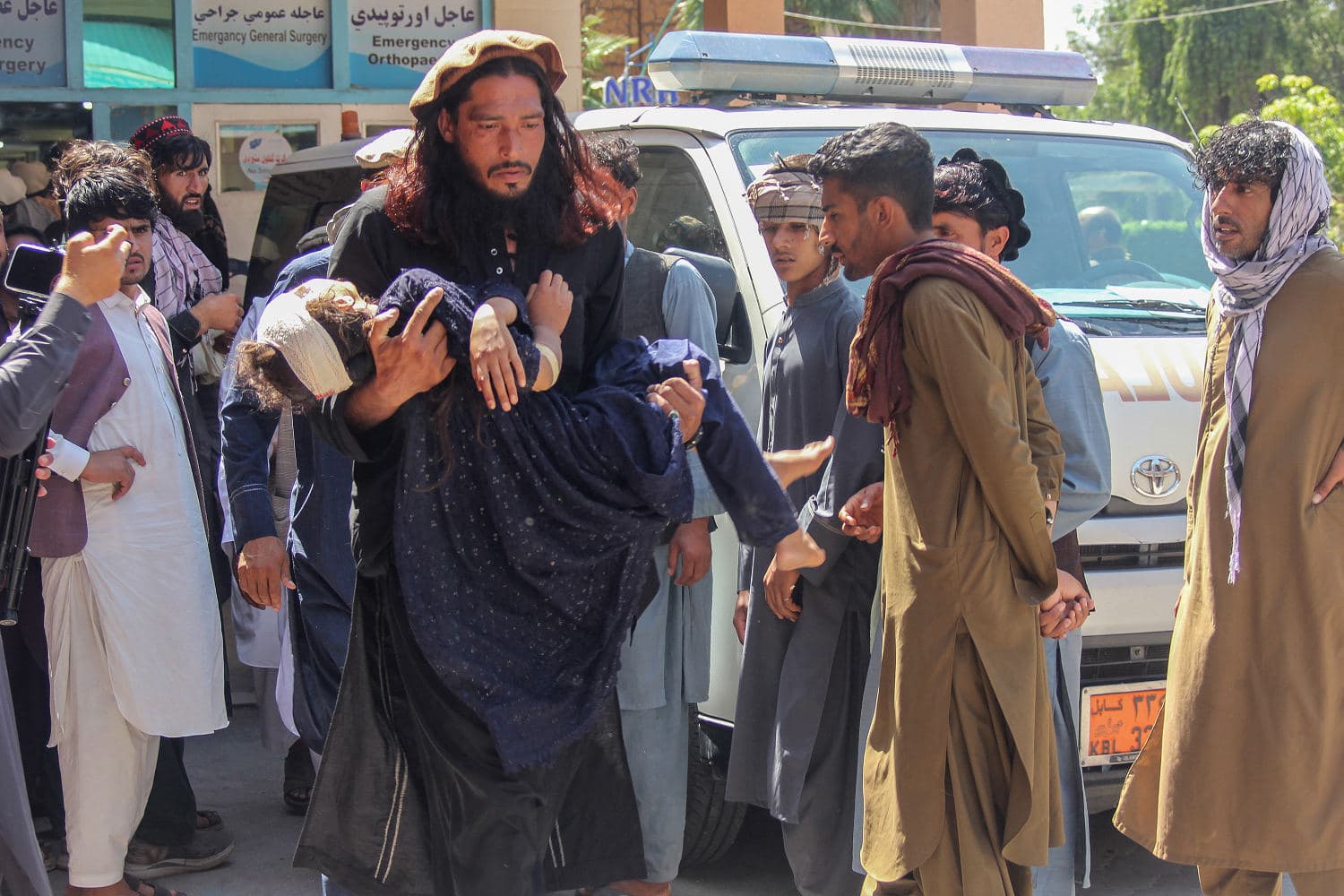 Truck accident scene in eastern Afghanistan involving refugees returning from Pakistan