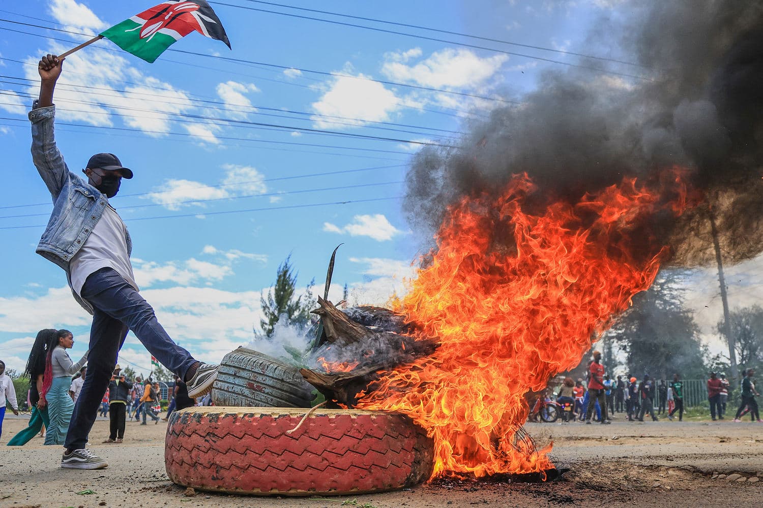 Protesters in Kenya demonstrating against the U.S. Ebola quarantine center plan.