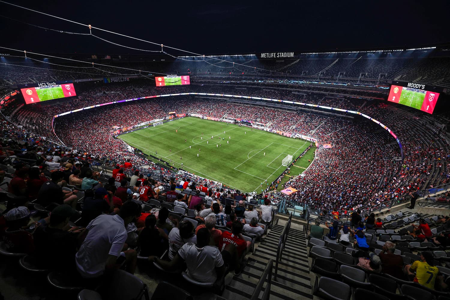 Public health officials discussing measles prevention strategies ahead of the World Cup.