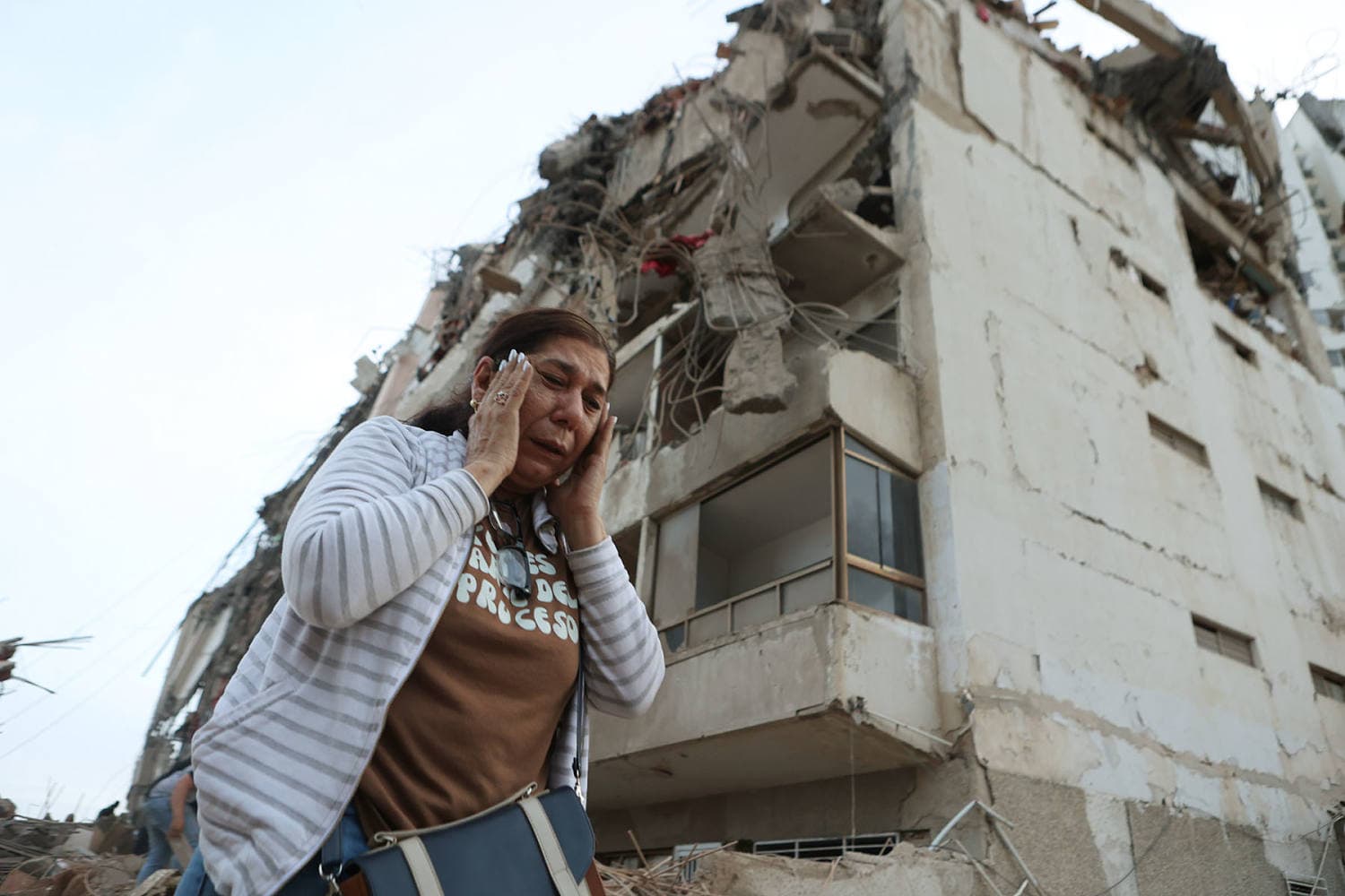 Aerial view of earthquake damage in Venezuela with rescue efforts underway.