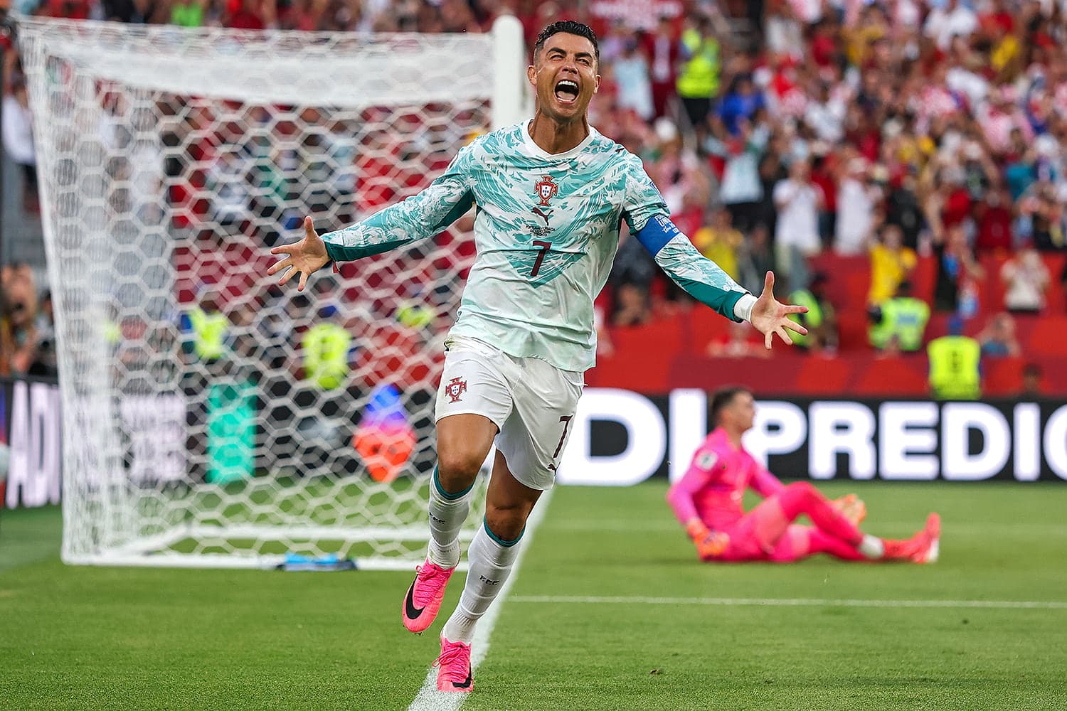 Cristiano Ronaldo celebrating his penalty goal during the World Cup match against Croatia.