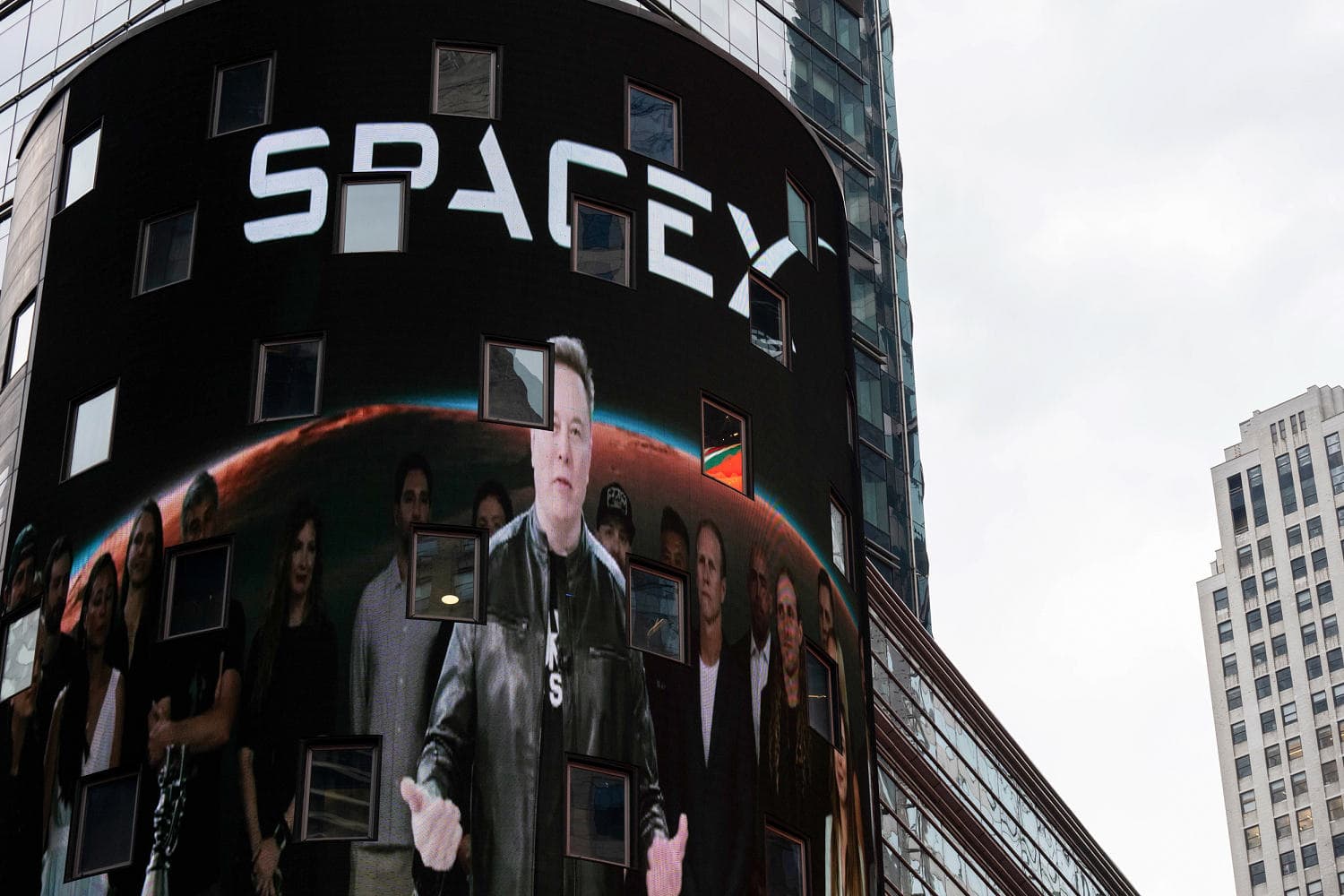 SpaceX logo with a backdrop of AI technology graphics
