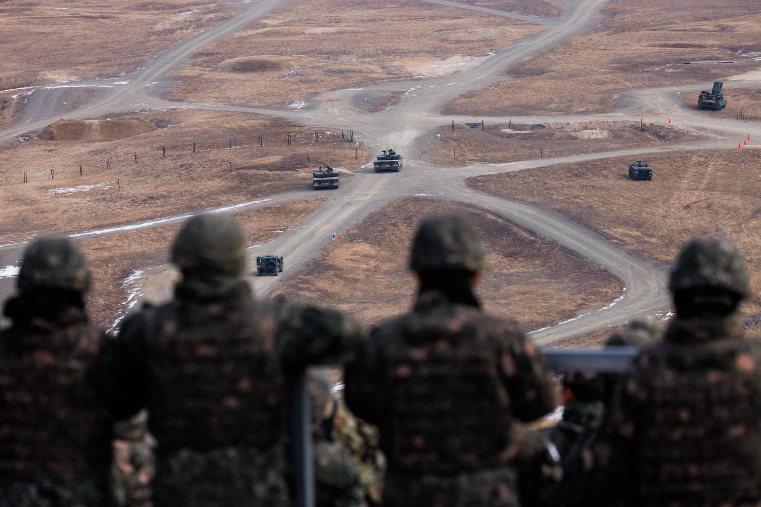A visual representation of the U.S.-South Korea military drills and the impact of Trump's directive on regional security.