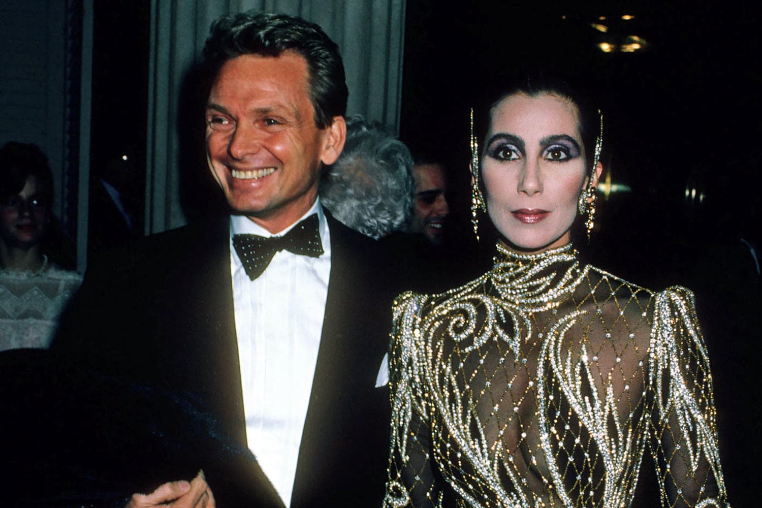 A collage of Bob Mackie's iconic costume designs worn by Cher and Diana Ross.